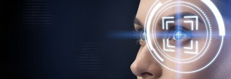Iris recognition concept. Eye scan of Caucasian lady on dark background, creative collage with copy space. Panoramaの写真素材