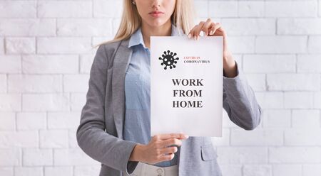 Coronavirus epidemic. Girl calls people work from home, cropped
