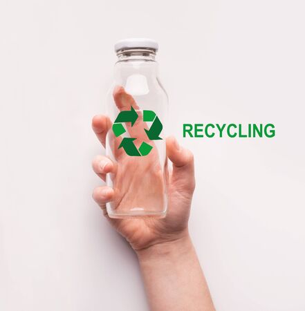 Reusable waste concept. Woman holding glass bottle with recycling emblem on white background, top view. Collageの写真素材