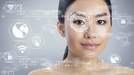 Biometric security check. Eye scanning of Asian woman, collage with information on transparent screen, free space. Panoramaの写真素材