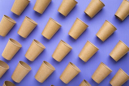 Rejection of plastic. Paper cups on purple background, seamless patternの写真素材