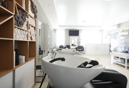 Hairdressing equipment concept. Wash sink in interior of hairdressing salon