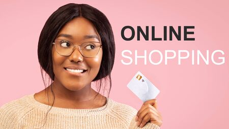 Online shopping during COVID-19 outbreak. African American girl with credit card on pink background, collage. Panoramaの写真素材