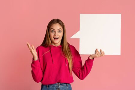 Surprised teenager girl holds abstract place for words