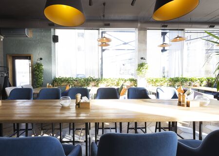 Empty restaurant with modern interior, copy space. Comfortable cozy place for having a rest, without...