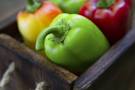Zero waste and eco concept. Fresh and clean sweet pepper in vintage wooden boxの写真素材