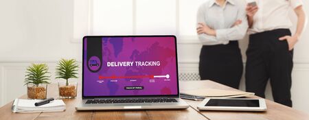 Corporate delivery tracking. Logistic digital shopping advert concept, workers on background, panoramaの写真素材