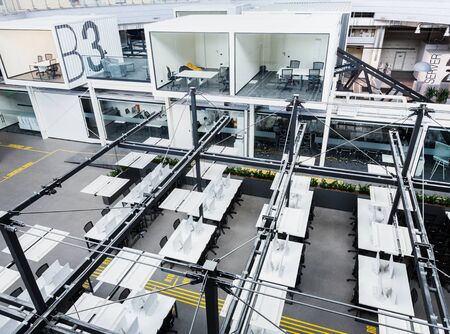 Top view of empty IT office, covered computers, no workers, coronacrisis, remote work