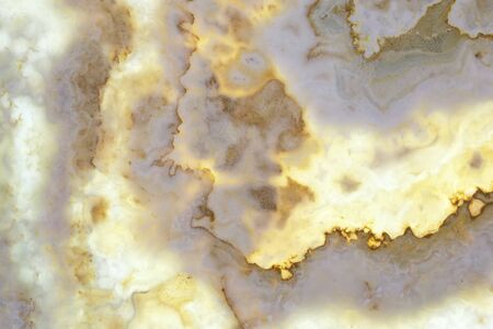 Futuristic stains and bright light on marble surface, texture