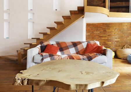 Coworking loft country style with sofa and wooden table