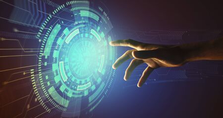 Advanced technologies. Collage of male hand touching virtual screen with high tech graphic user interface, blue background. Panoramaの写真素材