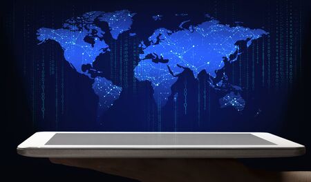 Technologies for global networking. Man holding tablet with world map, computer code and web...