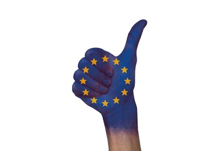 European Quality. Human Hand With Painted Europe Union Flag Gesturing Thumb Up Isolated On White Background, Copy Spaceの写真素材