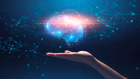 Artificial intelligence concept. Hand holding shining brain over galaxy background