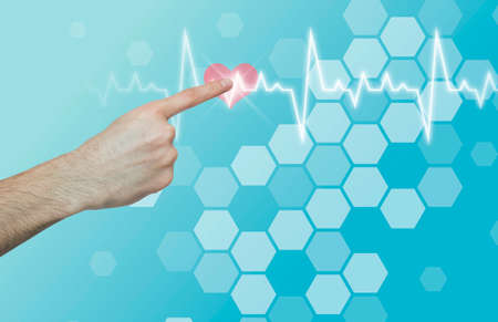Medicine and science. Male hand pressing heart on imaginary screen, collage with cardiogram and...