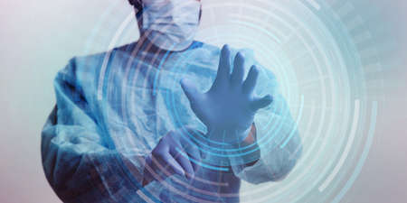 Medicine And Innovative Technologies Concept. Doctor in surgical mask putting on protective gloves,...