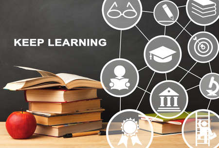 Keep Learning. Books Lying On Desk, Educational Collage With Icons And Text Over Black Background.