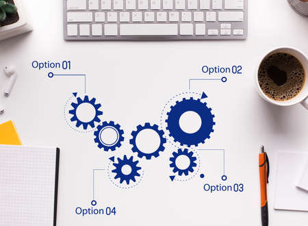 Blue Scheme Of Working Cogwheels Mechanism Over White Office Desk Background With Computer Keyboard. Business Technologies And Solutions Concept. Conceptual Collage, View From Aboveの写真素材