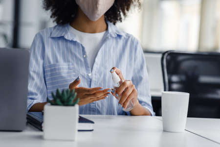 New normal and virus protection at covid outbreak. Focus on african american lady in protective mask...