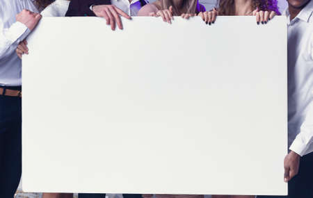 Unrecognizable Millennial Men And Women Holding Empty Invitation Poster Indoor. Corporate Party...