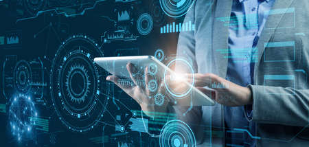 Smart technologies concept. Unrecognizable female manager using digital tablet computer to analyze...