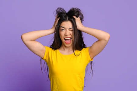 Mad Mood. Crazy Young Asian Woman Touching Her Tousled Hair And Winking At Camera, Playful Korean...