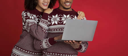 Online meeting and congratulating relatives by video call for Xmas and New Year. Happy african...