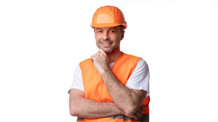Construction Workers Portrait. Builder Worker Man In Orange Uniform And Hardhat Posing Smiling To...