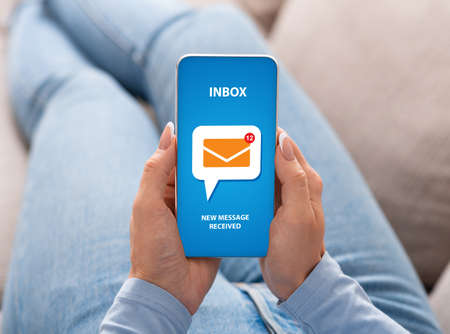 Collage with woman receiving new emails on her smartphone, close up of hands. Young lady holding mobile device with digital correspondence service application. Modern business technologies conceptの写真素材