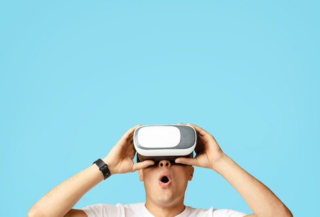 Modern devices and amazing entertainment or wow, its amazing. Highly shocked and excited millennial...