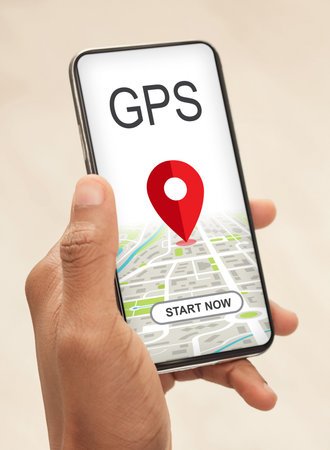 Modern gps application. African american man using smartphone with location tracking app on screen, black guy hand holding cellphone with opened navigation system, creative collage, closeupの写真素材