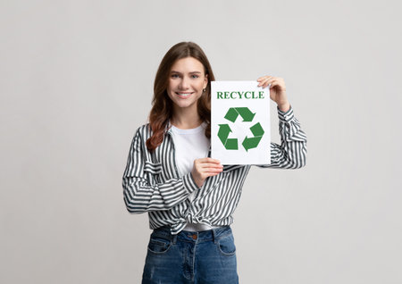 Recycle Concept. Young Smiling Woman Holding Placard With Green Recycling Sign, Positive...
