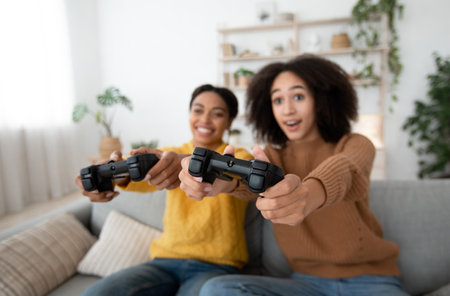 Xbox, enjoying of playing in video game on playstation and rest at home. Smiling surprised excited...
