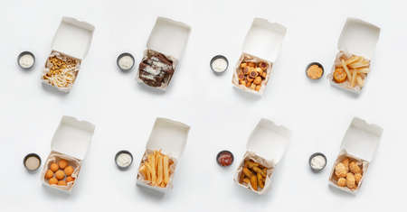 Online order of lunch to work or home and delivery eat during covid-19. Set in paper boxes, crispy...