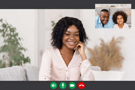 Modern Distant Communication. Portrait screen view of cheerful young black woman making online video...
