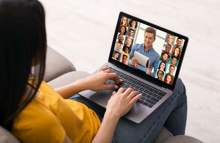 Online Education Concept. Unrecognizable Woman Study With Laptop Computer At Home, Having Video...