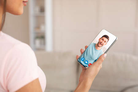 Virtual Call. Unrecognizable Lady Video Chatting With Boyfriend Via Teleconference On Smartphoneの写真素材