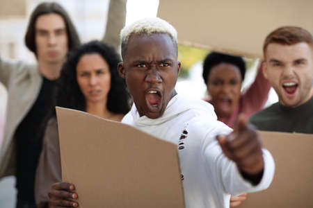 Black guy leading international group of students protestors
