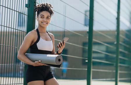 Outdoor workout during  pandemic with gadgets