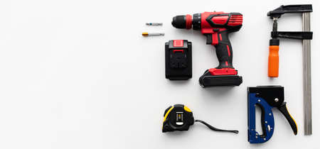 Building instrument set on the white background, panorama with free space. Top view of professional...