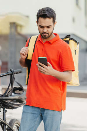 Online order, gps coordinates and modern devices for workの写真素材