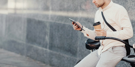 Businessman, employee or manager on break with deviceの写真素材