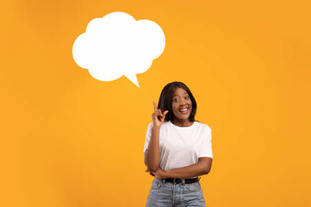 Inspired african american lady with communication bubble pointing finger up