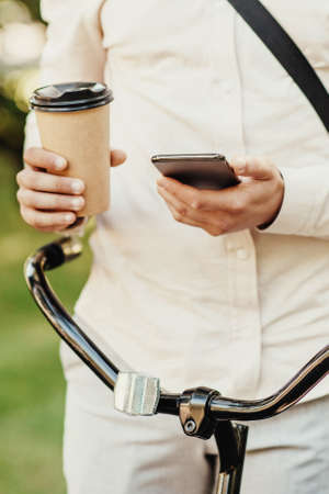 Eco transport and coffee break in park or on street