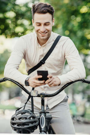 Modern mobile technology and urgent work on way to office at morningの写真素材