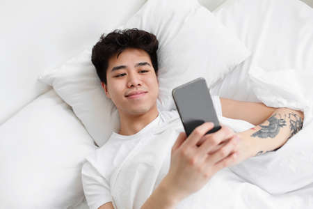 Spare time on weekend, news in social networks and self-isolation at home, covid-19の写真素材