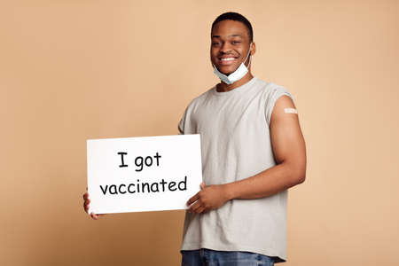 Happy African Man Holding Poster I Got Vaccinated, Beige Background