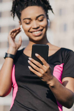 Modern gadgets for sports and jogging in city. Workout outdoorの写真素材