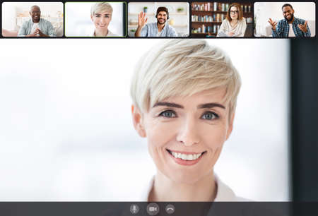 Smiling diverse people talking making online videochat, screen interface viewの写真素材