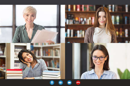 Smiling women making online videochat, screen viewの写真素材